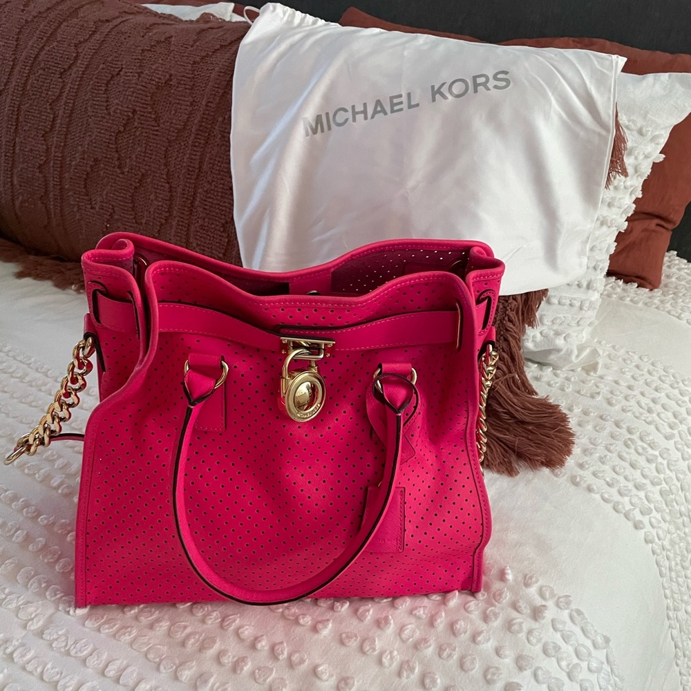 Beautiful hot pink perforated Michael Kors purse
